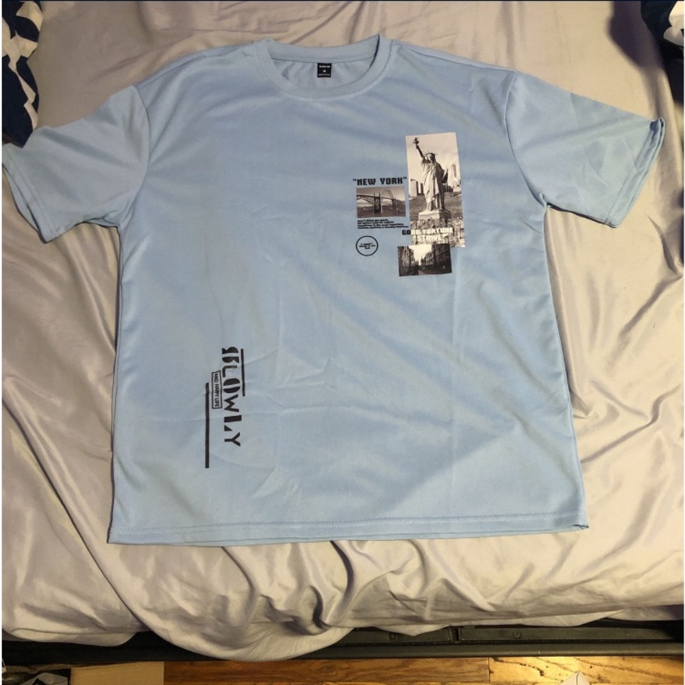 Blue  photo graphic Tee Shirt
Medium size